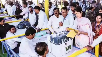 Polling officials collect EVMs on the eve of the second phase of Bihar assembly elections in East Champaran 12 Bihar ministers among 1,302 candidates entering last-lap fight